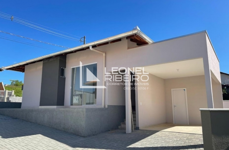 Casa nova em condom�nio em Timb�